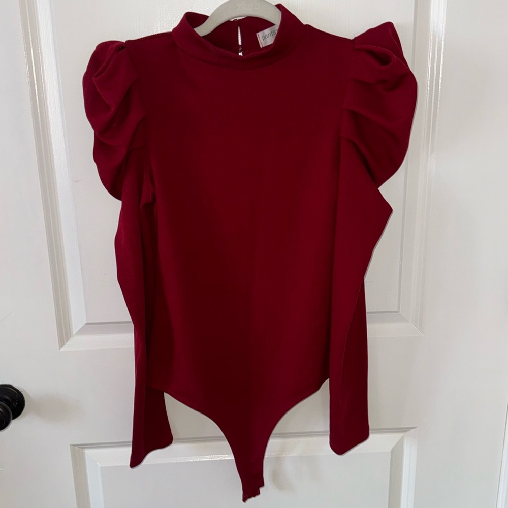 PANTS STORE size large crimson body suit with puff sleeves